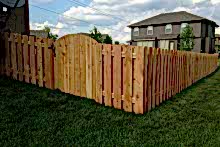 4' tall cedar shadow box fence with arched gate